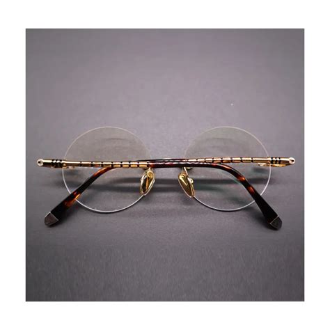 semi rimless tortoise shell eyeglasses.